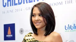 Di sana, Lala tak langsung masuk industri rekaman. Karirnya berawal dari kafe ke kafe. Berdarah Jawa dan piawai bermain gitar menjadi ciri khas Lala di mata masyarakat Filipina, Jakarta, senin (16/6/2014) (Liputan6.com/Panji Diksana).