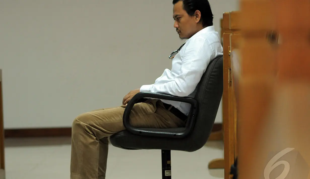 Putra Menteri Koperasi dan UKM, Syarief Hasan, ini dihadirkan dalam sidang dugaan korupsi proyek videotron  di Pengadilan Tipikor, Jakarta, Rabu (18/6/2014) (Liputan6.com/Faisal R Syam)