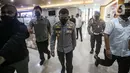 Kadiv Propam Polri nonaktif Irjen Ferdy Sambo menghadiri pemeriksaan Bareskrim Polri atas laporan dari keluarga Brigadir J. Ferdy Sambo di Gedung Bareskrim Mabes Polri, Jakarta, Kamis (4/8/2022). Ferdy Sambo didampingi oleh sejumlah anggota Divisi Propam.  (Liputan6.com/Faizal Fanani)