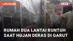 Sebuah rumah dua lantai di Sukamerang, Garut, ambruk saat hujan deras. Bagian depan rumah milik Bambang (60) runtuh