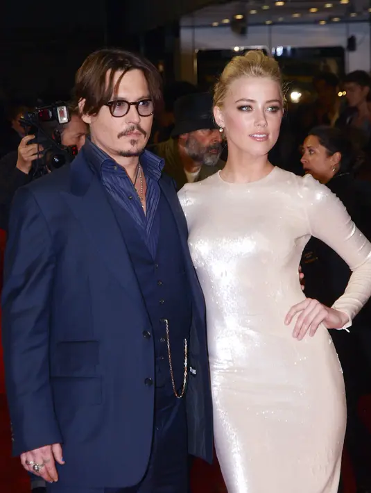 Amber Heard meminta ganti rugi uang sebesar 200 Milyar dan menuntut Johnny Depp pada pihak berwajib. (AFP/Bintang.com)