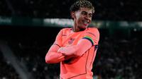 Pemain Barcelona Lamine Yamal merayakan gol pada laga La Liga/Liga Spanyol antara Elche vs Barcelona di Elche, Spanyol, Sabtu, 31 Januari 2026. (AP Photo/Jose Breton)