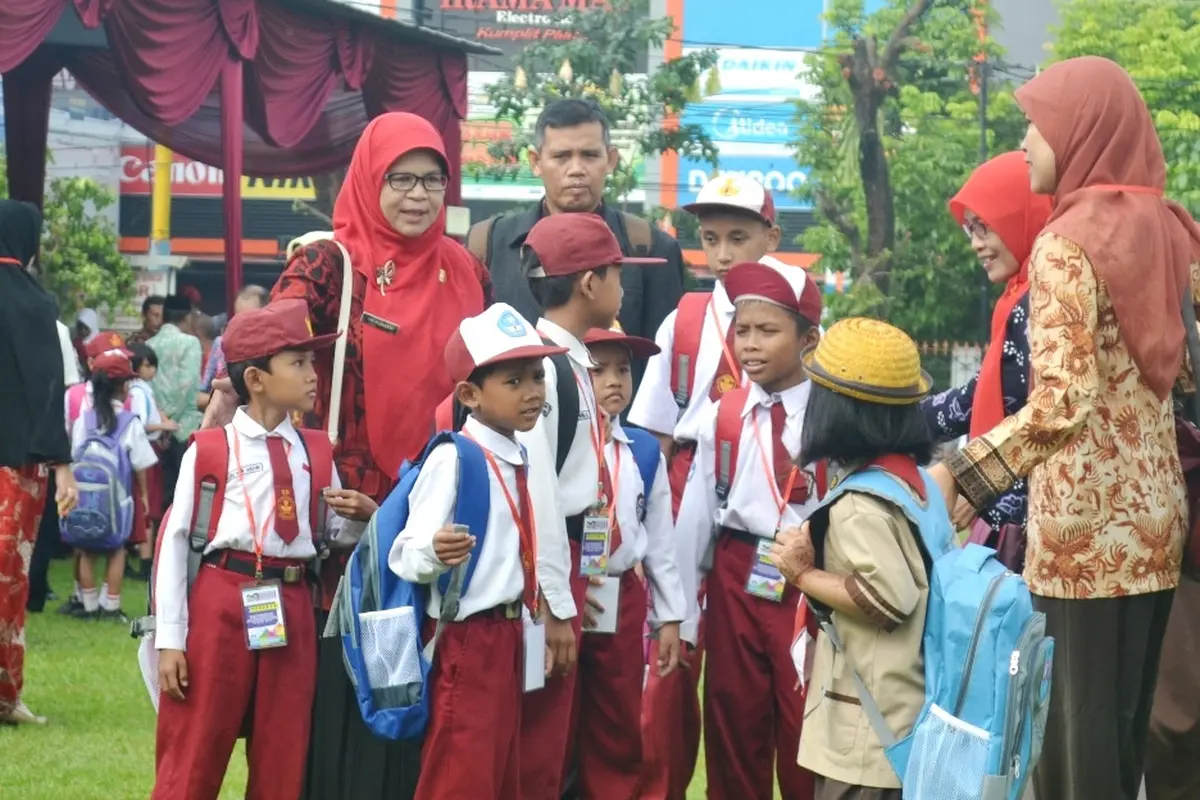 Ilustrasi – Guru dan siswa. (Foto: Liputan6.com/Muhamad Ridlo)