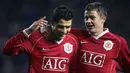 Ole Gunnar Solskjaer (kanan) dan Cristiano Ronaldo ternyata pernah menjadi rekan setim di Manchester United pada kurun 2003-2007. Kini, mereka kembali bertemu usai Ole diangkat sebagai manajer pada tahun 2018 dan Ronaldo yang memilih kembali ke Old Trafford pada musim panas lalu. (AFP/Paul Ellis)