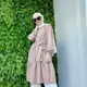 Tampil clean namun tetap stylish di Hari Raya, bisa tiru gaya istri Pasha Ungu ini. padukan tunik ruffle dengan celana kulot dan hijab pashmina warna putih. (Instagram/adeliapasha).