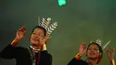 Penari menampilkan tarian tradisional di hari terakhir Festival Tawang di perbatasan Indo-China, utara timur negara bagian Arunachal Pradesh, India (23/10). (AFP/ Tauseef Mustafa)