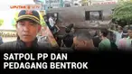 Penertiban pedagang kaki lima di Padang, Sumatra Barat, berlangsung ricuh. Pedagang dan petugas Satpol PP saling lempar batu sehingga mengakibatkan sejumlah orang terluka.