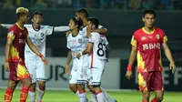 Pemain Bali United rayakan gol Sylvano Comvalius ke gawang Bhayangkara FC pada laga di Stadion Patriot, Bekasi, Jumat (29/9/2017). (Liputan6.com/Helmi Fithriansyah)