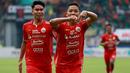 Pemain Persija Jakarta, Rio Fahmi (kanan) melakukan selebrasi setelah mencetak gol kedua Persija ke gawang Rans Nusantara FC pada laga BRI Liga 1 di Stadion Patriot Candrabhaga, Bekasi, Jumat (3/2/2023). Macan Kemayoran menang dengan skor 3-1. (Bola.com/M Iqbal Ichsan)