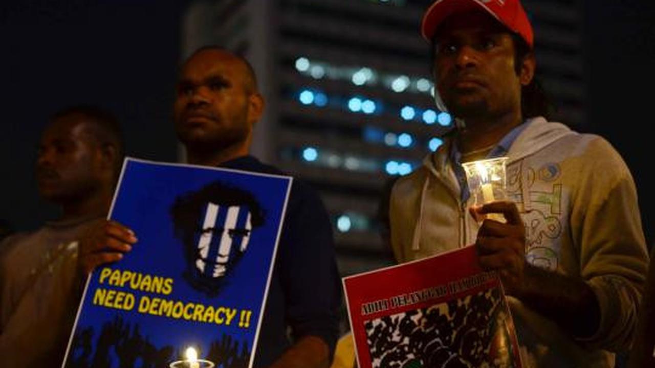 Aksi lilin solidaritas untuk Papua