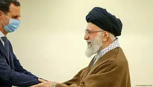 Hubungan Suriah dan Iran, Bashar al-Assad dan Ayatollah Ali Khamenei di Teheran. (AFP)