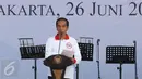 Presiden Jokowi saat memberi sambutan di acara peringatan Hari Anti Narkotika Internasional (HANI) di kawasan Taman Sari, Jakarta, Minggu (26/6). Peringatan HANI merupakan wujud kepedulian terhadap ancaman narkoba. (Liputan6.com/Herman Zakharia)