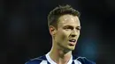 9. Jonny Evans - WBA akan tak hanya terancam turun kasta namun juga akan ditinggalkan pemain bintang sekelas Jonny Evans. Mantan pemain MU tersebut dirasa tidak pantas bermain di kasta kedua Liga Inggris. (AFP/Oli Scarff)