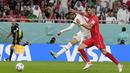 <p>Youssef En-Nesyri kemudian berhasil membawa Maroko unggul 2-0 atas Kanada. Ia sukses memanfaatkan umpan terobos yang dikirim oleh Hakim Ziyech dari sisi kanan Maroko. (AP/Natacha Pisarenko)</p>