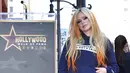 <p>Avril Lavigne menerima bintang di Hollywood Walk of Fame. (Foto: Richard Shotwell/Invision/AP)</p>