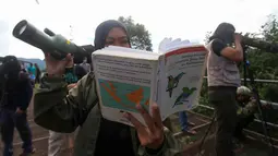 Pengamatan burung yang mengusung tema "Nyanyikan, Terbang, Menjulang – Seperti Burung!" (Sing, Fly, Soar - Like A Bird!) menjadi penting bukan hanya untuk mengenal keaneragaman burung, namun juga sebagai indikator kondisi alam yang menjadi habitat satwa terbang tersebut. (Liputan6.com/Fery Pradolo)