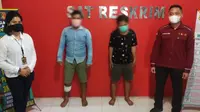 Polres Gorontalo, berhasil menangkap dua pelaku pencurian Handphone yang akhir-akhir ini kerap meresahkan warga Kabupaten Gorontalo.(Arfandi Ibrahim/Liputan6.com)