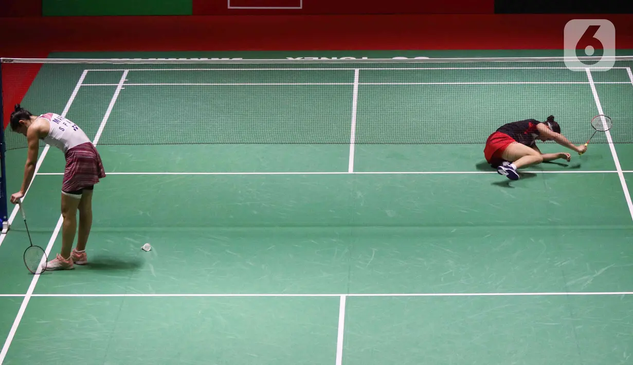 Pebulu tangkis tunggal putri Korea Selatan, An Se Young saat bertanding melawan Carolina Marin dari Spanyol pada laga final Indonesia Masters 2023 di Istora Senayan, Jakarta, Minggu (29/1/2023). An Se Young berhasil menjadi juara di nomor tunggal putri Indonesia Masters 2023 usai mengalahkan Carolina Marin di final dengan skor 18-21, 21-18, dan 21-13. (Liputan6.com/Herman Zakharia)