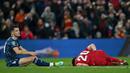 Granit Xhaka. Gelandang Arsenal ini mendapat kartu merah langsung akibat pelanggaran keras terhadap Diogo Jota di menit ke-24 saat dijamu Liverpool di leg pertama semifinal Carabao Cup 2021/2022, 13 Januari 2022. Skor akhir kedua tim bermain imbang 0-0. (AFP/Paul Ellis)