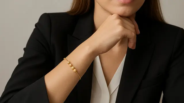 Model Gelang Emas Elegan 2 Gram dengan Bola Kecil Tren 2025/ Ilustrasi oleh AI