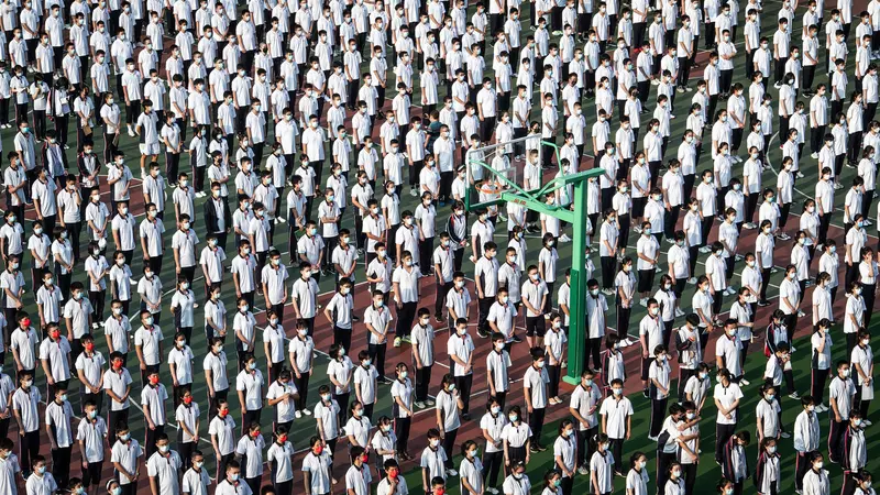 FOTO: Hari Pertama Sekolah Tatap Muka di China