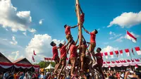 Trik Panjat Pinang Supaya Tidak Licin, Ketahui Tekniknya