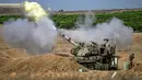 Situs Channel News Asia (CNA) yang dikutip Minggu (15/10/2023) melaporkan Israel bersiap pada Sabtu 14 Oktober waktu setempat untuk melancarkan serangan darat di Jalur Gaza yang dikuasai Hamas, setelah memerintahkan warga Palestina yang tinggal di wilayah padat penduduk untuk melarikan diri ke selatan menuju perbatasan tertutup dengan Mesir. (Aris MESSINIS/AFP)