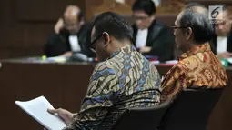 Terdakwa Irvanto Hendra Pambudi yang juga keponakan Setya Novanto dan Made Oka Masagung menjalani sidang perdana kasus fee korupsi e-KTP di Pengadilan Tipikor, Jakarta, Senin (30/7). (Merdeka.com/Iqbal S Nugroho)