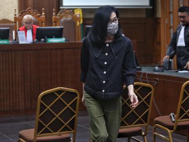 Terdakwa suap kepada hakim pemberi vonis bebas Gregorius Ronald Tannur, Meirizka Widjaja usai mengikuti sidang pembacaan dakwaan di Pengadilan Tindak Pidana Korupsi (Tipikor) Jakarta, Senin (10/2/2025). (Liputan6.com/Angga Yuniar)