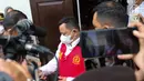 Terdakwa kasus pembunuhan Brigadir Yosua, Kuat Ma'ruf mengenakan rompi merah seusai menjalani sidang dengan agenda pembacaan vonis dari majelis hakim di PN Jakarta Selatan, Selasa (14/2/2023). (Liputan6.com/Herman Zakharia)
