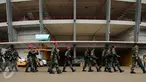 Pasukan gabungan TNI-Polri mengarak replika tandu Jenderal Sudirman memasuki kawasan Stadion GBK, Jakarta, Jumat (22/1/2016). Puncak peringatan HUT ke 100 Jenderal Sudirman akan dipusatkan di Stadion GBK Jakarta. (Liputan6.com/Helmi Fithriansyah)