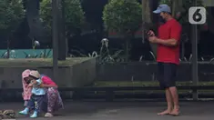Pasien Covid dengan status Orang Tanpa Gejala beraktivitas di Graha Wisata Taman Mini, Jakarta Timur, Minggu (20/6/2021). Kepala Dinas Kesehatan DKI Jakarta Widyastuti sebelumnya sempat menyebut ketersediaan tempat isolasi pasien COVID-19 di Jakarta terus menipis. (Liputan6.com/Herman Zakharia)