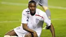 England's forward Carlton Cole reacts during a friendly football match against Spain at the Ramon Sanchez Pizjuan in Sevilla stadium on February 11, 2009. Spain won 2-0. AFP PHOTO / CRISTINA QUICLER 