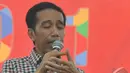 Jokowi  mengingatkan warga agar tidak mudah terpengaruh atau pun ikut terlibat dengan politik uang (money politics) , Madiun, Jawa Timur, Sabtu (28/6/2014) (Liputan6.com/Herman Zakharia)
