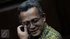 Terdakwa Ketua PTUN Medan, Tripeni Irianto Putro divonis Hakim dengan hukuman 2 tahun penjara dan denda Rp200 juta subsider 2 bulan kurungan, Jakarta, Kamis (17/12/2015). Tripeni terbukti menerima suap dari OC Kaligis. (Liputan6.com/Helmi Afandi)