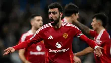 Gol Bruno Fernandes dari titik putih berhasil menyamakan kedudukan pada menit ke-88. Dua menit kemudian, Amad Diallo mencetak gol kemenangan yang sensasional di akhir pertandingan untuk Manchester United, juara Liga Inggris 20 kali itu. (Paul ELLIS/AFP)