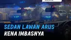 Sebuah mobil sedan pakai strobo lawan arus jalan viral di media sosial.