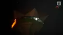 Pemandangan planet Mars berdampingan dengan gerhana bulan total terlihat di atas Masjid Baiturahman Semarang, Sabtu (278/7) dini hari.  Gerhana bulan total "Micro Blood Moon" tersebut merupakan yang terlama pada abad ini,. (Liputan6.com/Gholib)