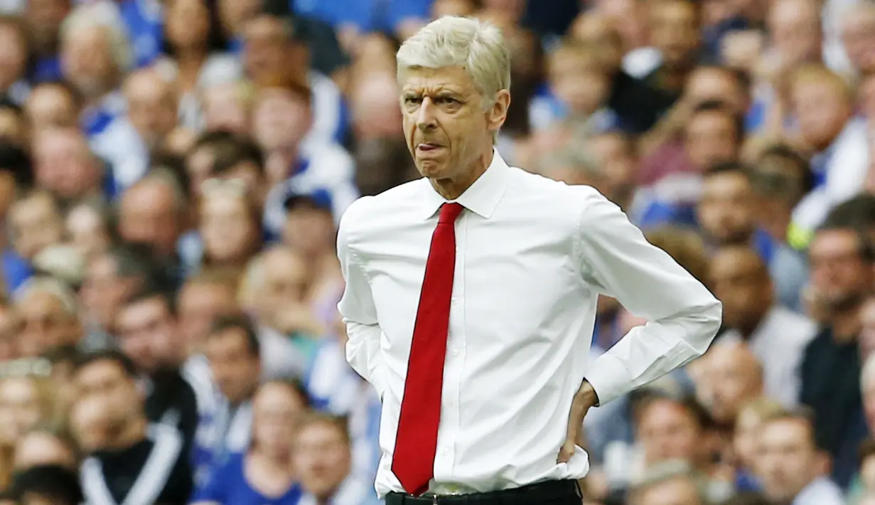 Arsene Wenger - Pelatih legendaris Arsenal ini pernah bentrok dengan Sir Alex Ferguson sebanyak 49 pertandingan. (Foto: AFP/Ian Kington)