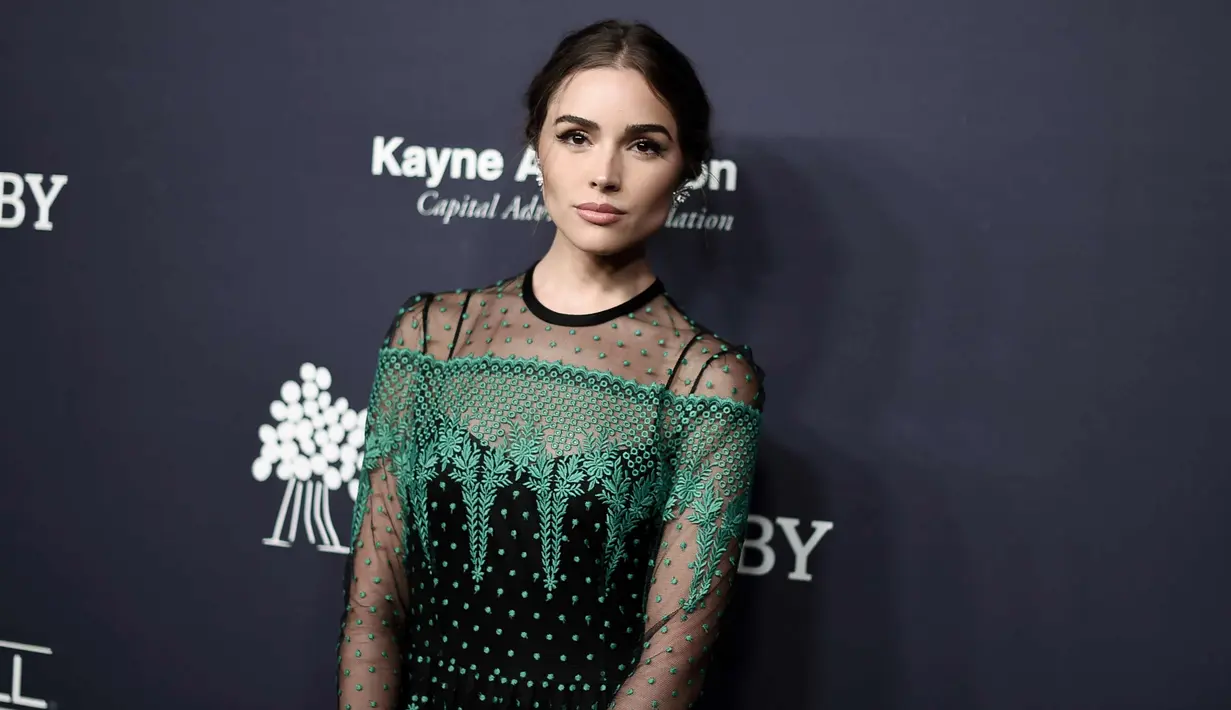 Model Olivia Culpo berpose saat menghadiri Gala Baby2Baby ke-6 di 3Labs, di Culver City, California  (11/11). (Photo by Richard Shotwell/Invision/AP)