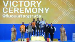 Bertanding di Chonburi Sports School, Chonburi, hari Senin (15/12/2025), Rizki Juniansyah tampil di kelas 79kg Putra atau naik 6kg lebih berat ketimbang saat meraih medali emas Olimpiade 2024. (Dok Kemenpora RI)