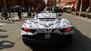 Mobil sport Maserati MC20 ditampilkan di Piazza Roma, Modena, Italia, Kamis (10/9/2020). Maserati MC20 dibanderol dengan harga Rp 9 miliar off the road atau sekitar Rp 12 hingga Rp 13 miliar termasuk pajak on the road. (Miguel MEDINA/AFP)