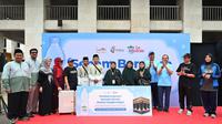 Pelepasan rombongan marbot Masjid Istiqlal yang diberangkatkan umrah Le Minerale. &copy;Istimewa