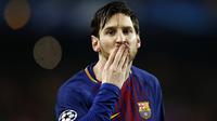 Penyerang Barcelona berselebrasi setelah mencetak gol ke gawang Chelsea pada pertandingan Liga Champions stadion Camp Nou di Barcelona, Spanyol pada 14 Maret 2018. Barcelona pada Kamis 5 Agustus 2021 bahwa Lionel Messi tidak akan bertahan dengan klub. (AP Photo/Manu Fernandez)