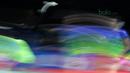 Tontowi Ahmad mengembalikan kok ke arah Hafiz Faizal/Gloria Emanuelle pada semifinal Indonesia Open 2018 di Istora Senayan, Jakarta, (7/6/2018). Tontowi/Liliyana menang 21-18, 21-8. (Bola.com/Nick Hanoatubun)