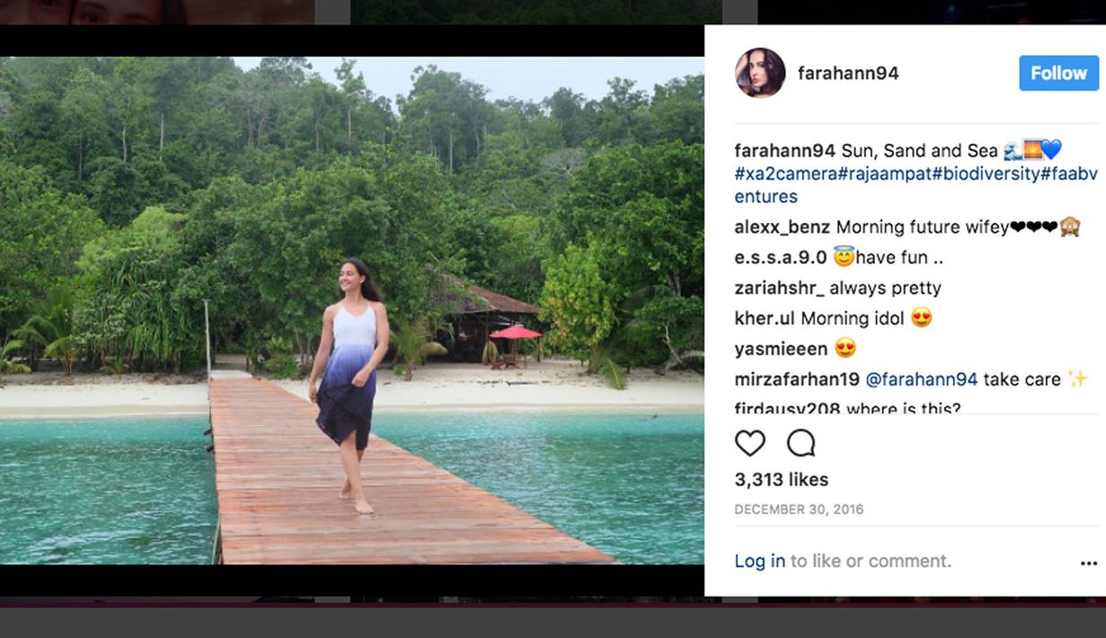 Farah Ann Abdul Hadi tengah menikmati suasana panas, pasir dan laut yang indah di Raja Ampat. Foto tersebut terpampang pada akun Instagram miliknya. (Instagram/Farah Ann)