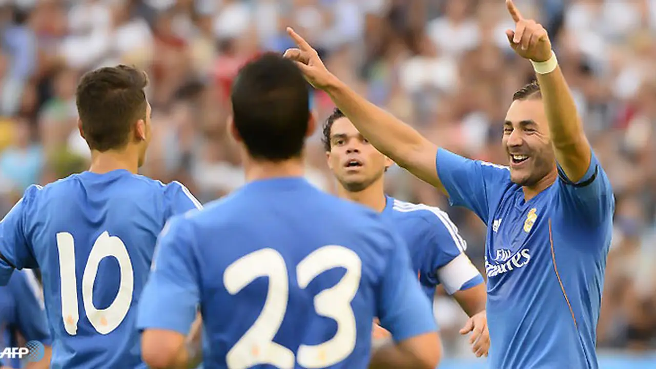 benzema-bawa-menang-130729a.jpg