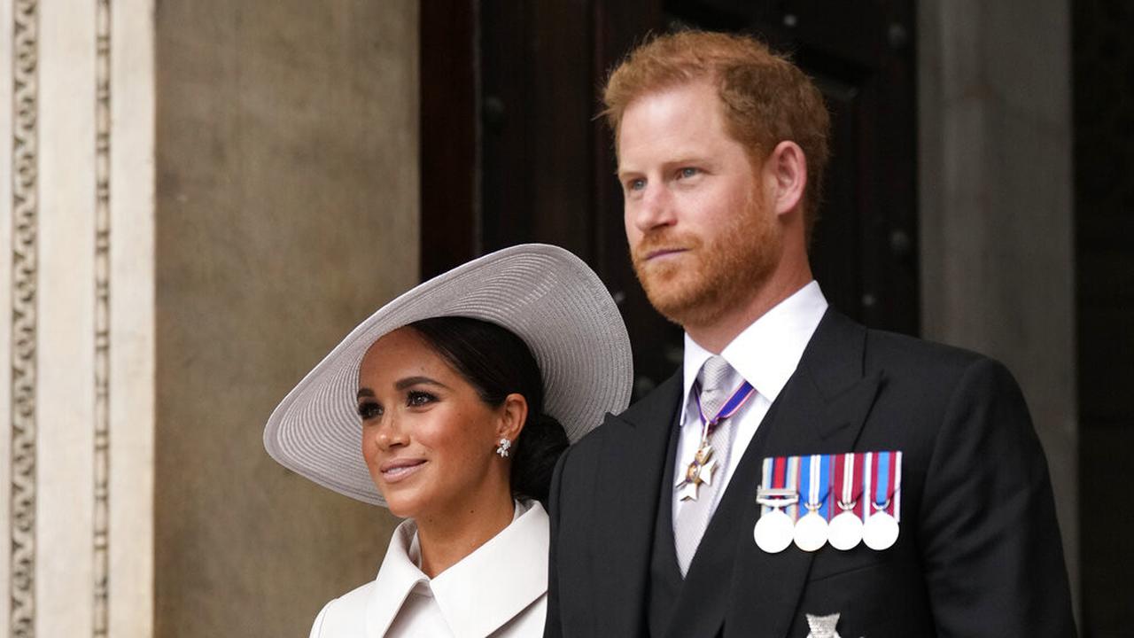Meghan Markle dan Pangeran Harry. (AP Photo/Matt Dunham, Pool)