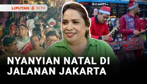 Ada suasana berbeda di trotoar Jalan Sudirman, Jakarta, jelang perayaan Natal. Beragam lagu Natal dilantunkan ribuan warga dalam Christmas Carol Collosal.