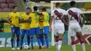 Dengan hasil ini Brasil sukses mempertahankan kesempurnaannya di Kualifikasi Piala Dunia 2022 Zona Conmebol dengan mencatat kemenangan ke-8 dari 8 laga. Brasil pun memimpin klasemen dengan nilai sempurna 24. (Foto: AP/Andre Penner)